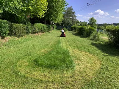 Spacious pitch in greenery